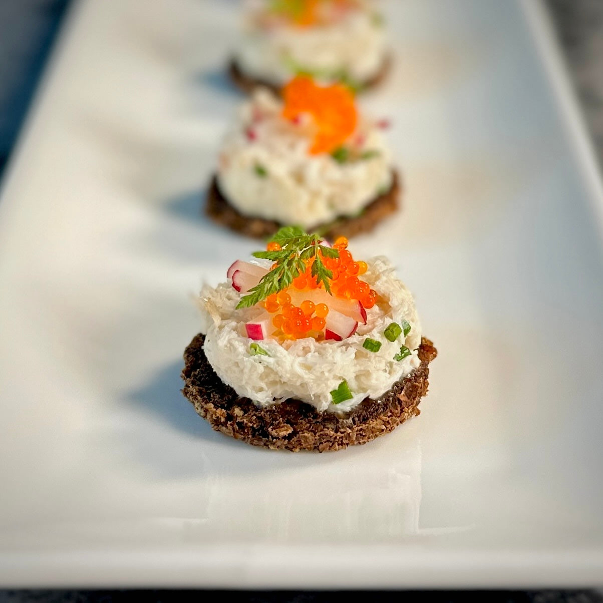Apple & Crab Salad with Tobiko on Pumpernickel